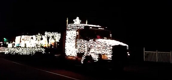 truckersnews's tweet image. Truckers light up their trucks for Christmas parade. bit.ly/1ThOjiy