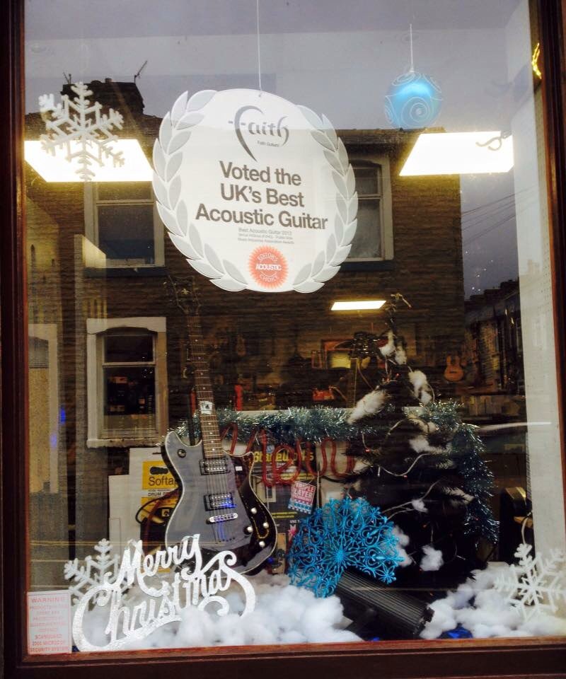 prosolomusic's tweet photo. Christmas display finished! #christmasshopping #santabringmeaguitar #burnley https://t.co/jLFnou532L