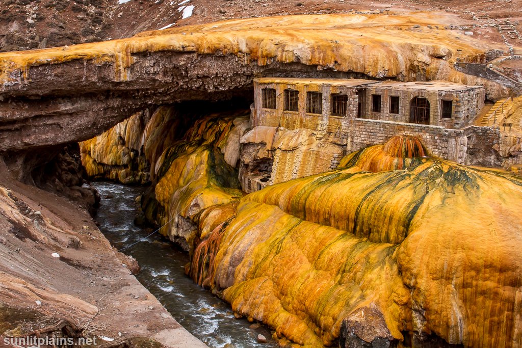 SunlitPlains's tweet photo. Puente del #Inca on 'Route 7' is a natural #bridge of mineral salts. Buildings are thermal baths. #travel #Argentina https://t.co/X3eKQnkquC