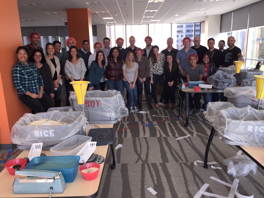 Demandbase's tweet photo. #flashbackfriday to when the @Demandbase team packed over 10K meals for #stophungernow! @SHNBayArea #fbf https://t.co/NsdaVduYdS