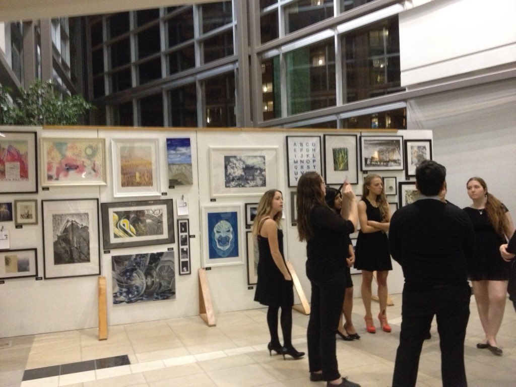 OutburstAuction's tweet photo. The Telus Centre is looking great, with all of the beautiful artwork hanging on the walls! #auction #yeg #yegevents https://t.co/FmgNFRu1CB