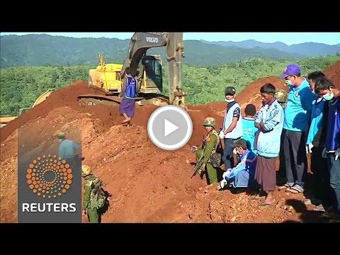 WLSA101's tweet photo. Searchers look for Myanmar landslide bodies https://t.co/ohUepnlgX8 #staged https://t.co/yBhIEINFHe