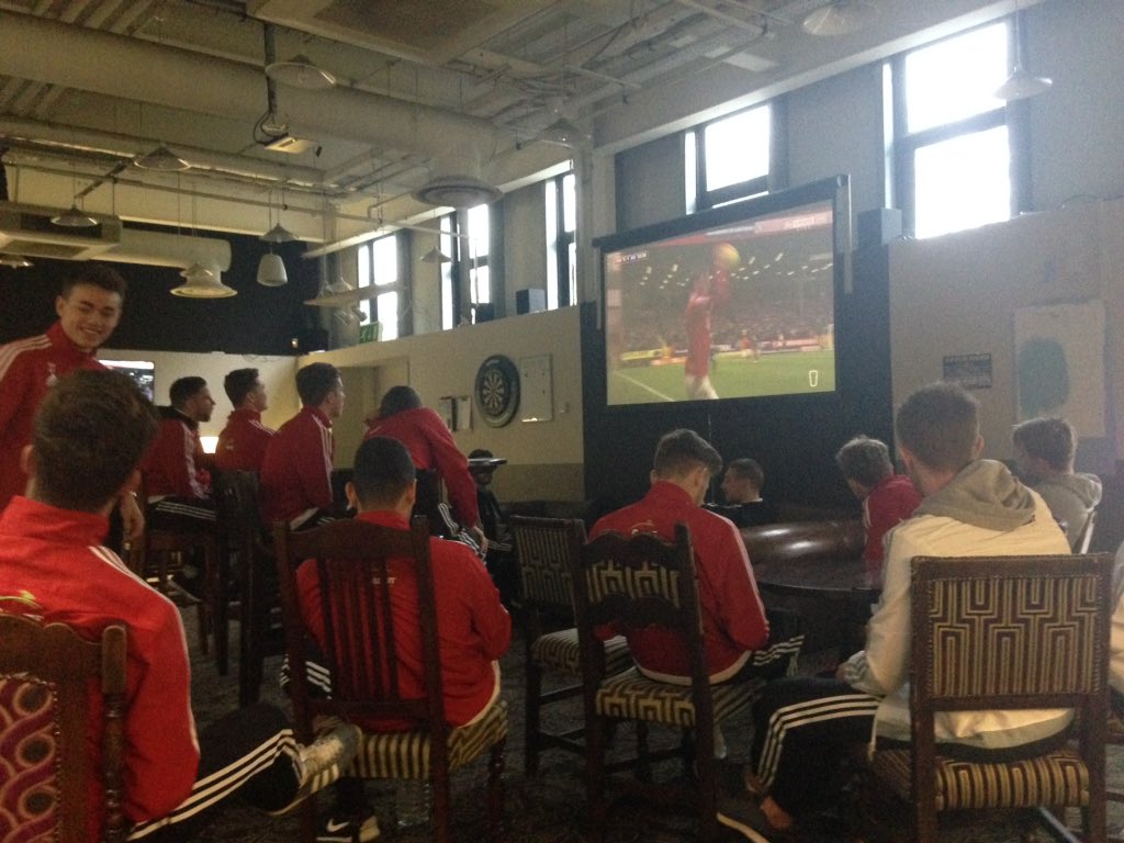 WorthingFC's tweet photo. Catching a bit of #CHAIPS ahead of our game this afternoon #RebelsOnTheRoad https://t.co/qhzEVqJZGo