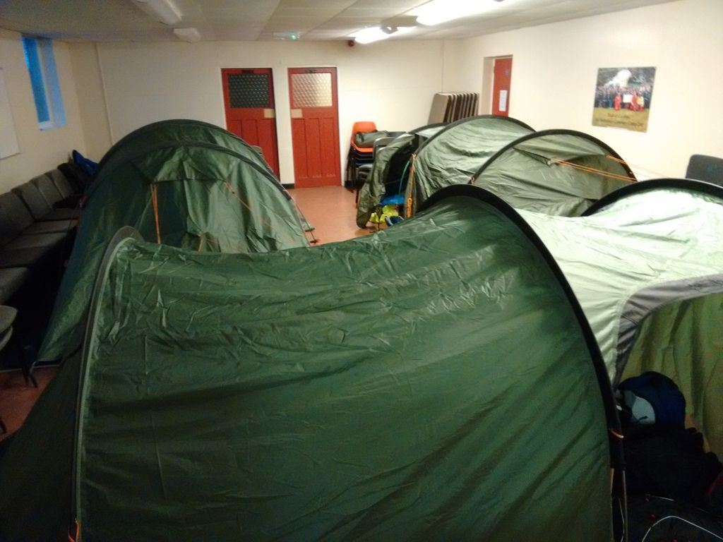 1stworkington's tweet photo. Met office wind warning of 68mph gusts isn't stopping the Scout winter practise camp. Heating off, tents inside... https://t.co/v8Dyl44QLh
