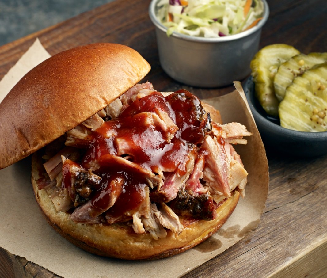 FamousDavesMD's tweet photo. Our award-winning, slow-smoked chopped pork sandwich is such a camera hog. 🐷 https://t.co/jE8yiNwIuY