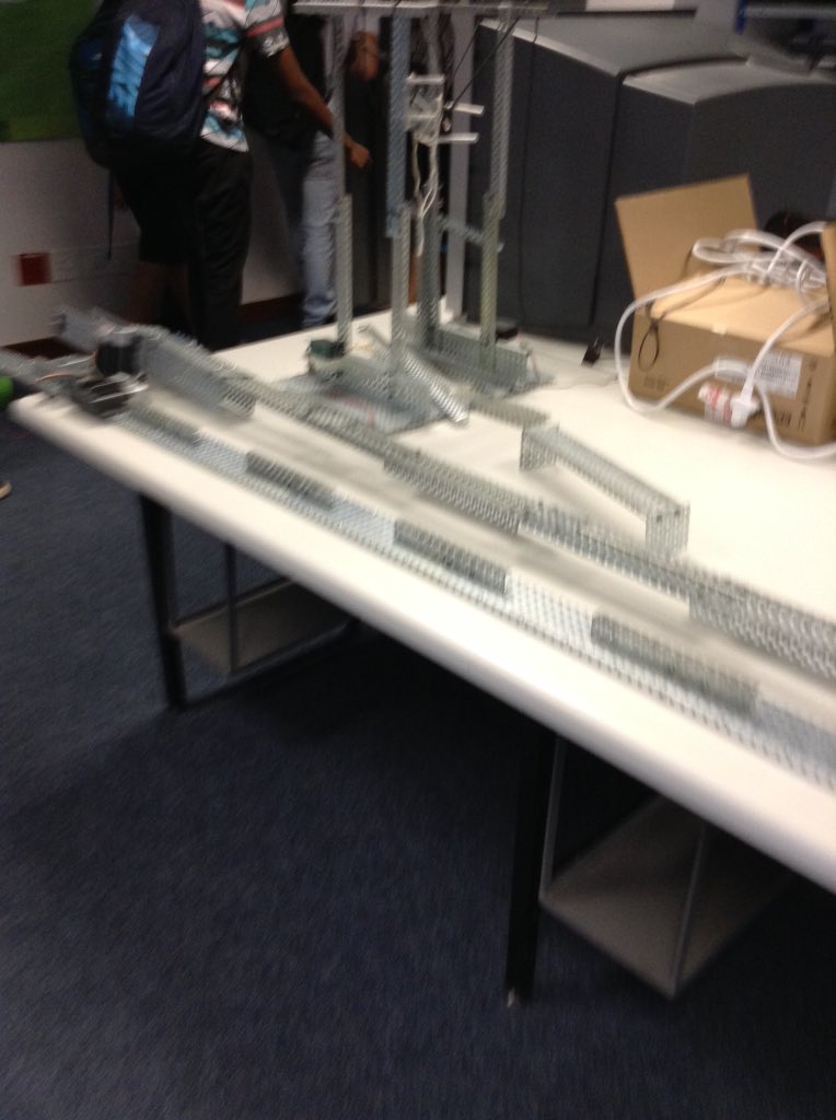 kdeacon357's tweet photo. 25/11 our robot is laying down on the table. Its a bit longer #aisjbot https://t.co/mJ6hvIR58i