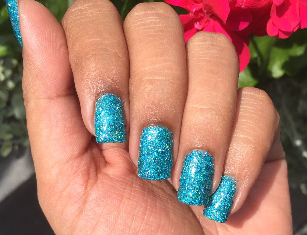 'Blitzen' by @StarrilyPolish is probably the best Christmas-in-summer polish ever! #indiepolish #nails #glitter