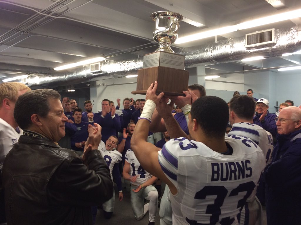 kstatesports's tweet photo. A new Governor's Cup trophy was presented to @KStateFB captains following 7th straight win over KU! #Family https://t.co/QIhPv4fW8b