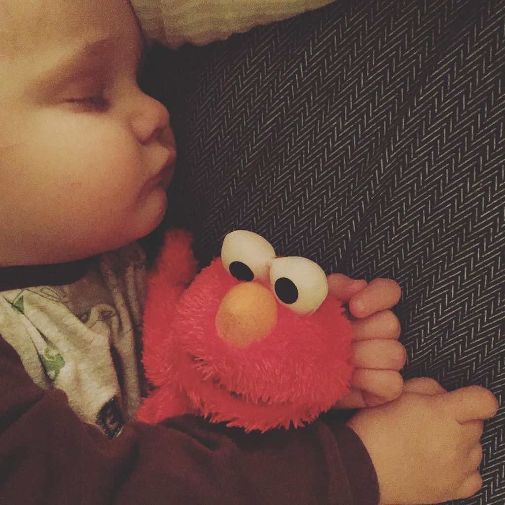 KimMoynes's tweet photo. Today's nonstop stream of "Elmo? Elmo? Elmo?" has finally ended. #unconscious #elmolove https://t.co/uMchz67GD9 https://t.co/XCxNflf52C