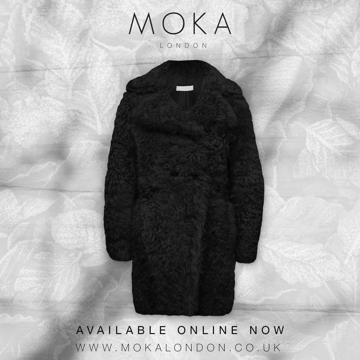 Treat yourself this Christmas to our black shearling cherry peacoat. Super warm and super stylish!