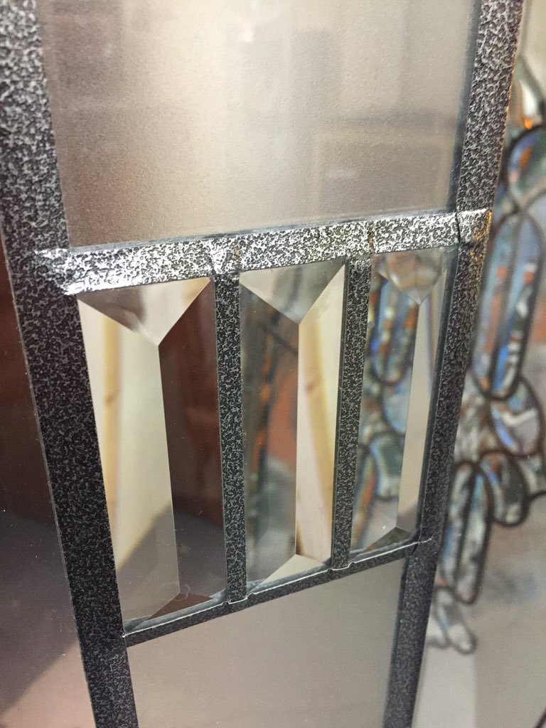 Close up of a panel showing what can be achieved by combining Decraled Rustic Iron, Decra Bevels &amp; textured film