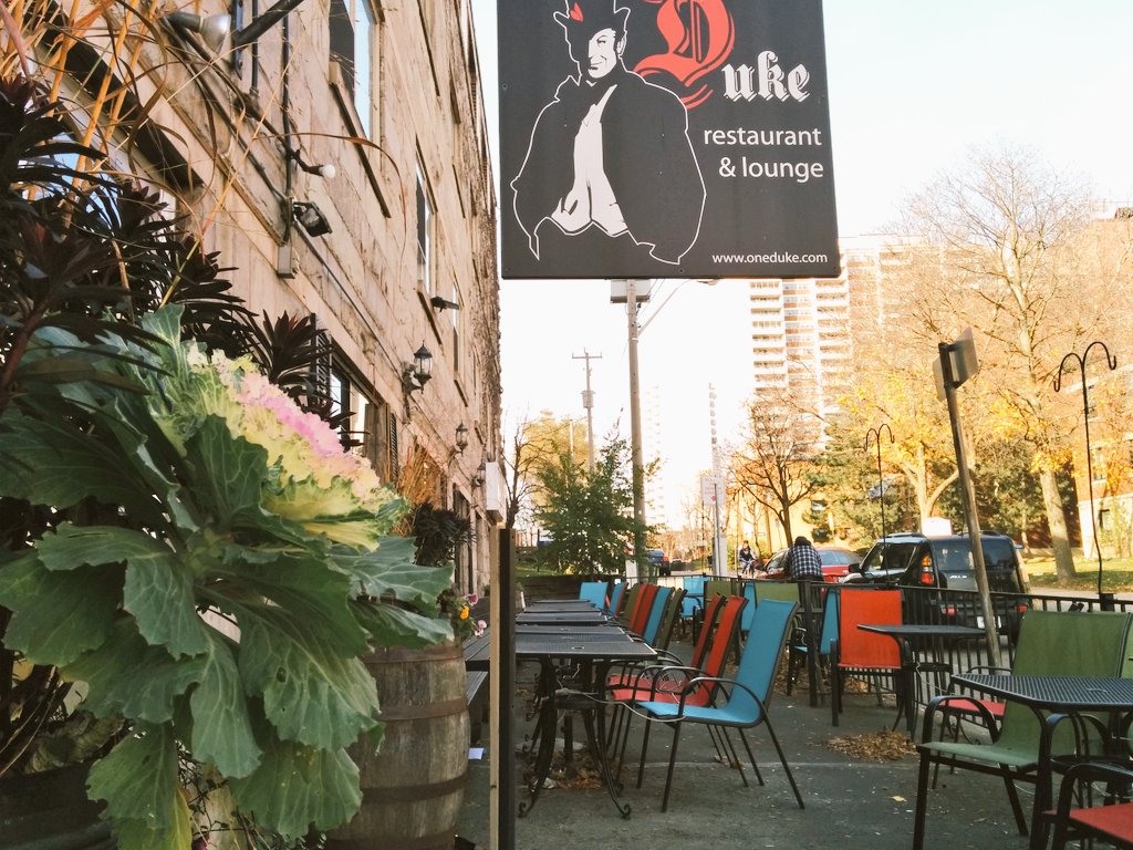 The colourful patio @onedukeresto is cheerful on a cold day in #HamOnt. #neighbours #JamesSouth