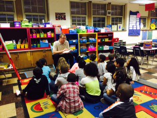 FWRISD's tweet photo. @michealcarton dedication toward students continues as he returned to FW to read with students and give away books! https://t.co/V65aGF5Q7Z