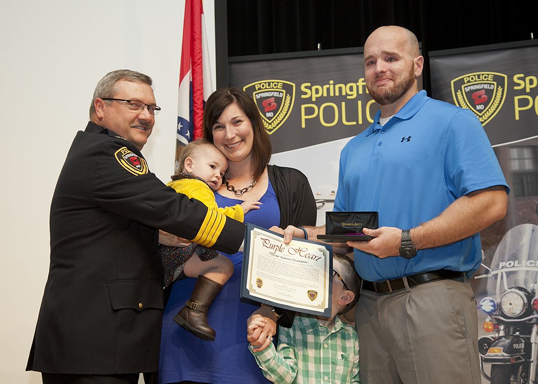 SGFPolice's tweet photo. Not a dry eye in the room as Ofc Pearson received the #PurpleHeart at our awards ceremony #prayersforpearson https://t.co/u3fjGU1K6v