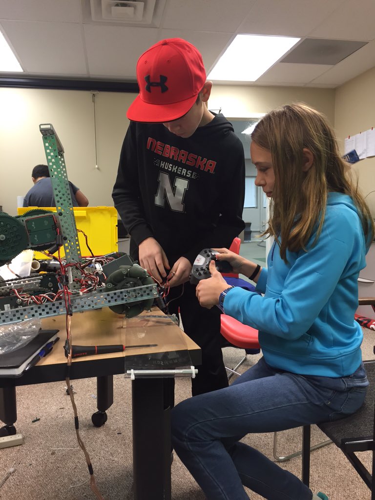 AuroraRobots's tweet photo. Avril and Cole working on Sub Zero! 6 week build period is finally here! #aurorarobotichuskies https://t.co/IRVANavcHM