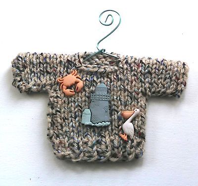 zeppy_seaside's tweet photo. Multicolored  seaside #themed mini sweater #christmas #ornament, LINK:
https://t.co/R71n1aMnGP https://t.co/glbE4DiQTd
