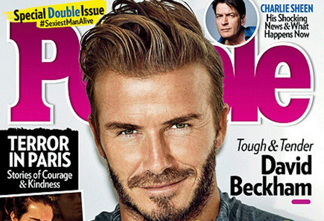 enews's tweet photo. Tough and tender! David Beckham is People Magazine's #SexiestManAlive for 2015: https://t.co/vPKrmhgNI4 https://t.co/q0rP6eQhDM