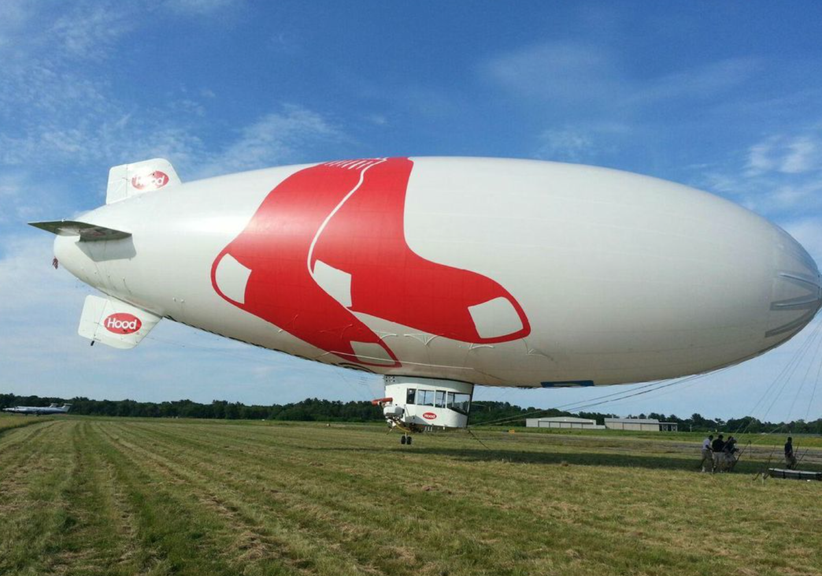 VanWagnerAerial's tweet photo. A big hello from the @hphood blimp! The first blimp to have a sports team logo grace its side. #TBT #BigBlimpin https://t.co/yeM1WnY598