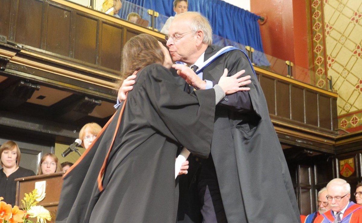 queensualumni's tweet photo. Ellie Sadinksy Jeffrey, MPA'15, gets hooded by her father @queensulaw prof emeritus Sonny Sadinsky. #QGrad15 https://t.co/oiziebABTq