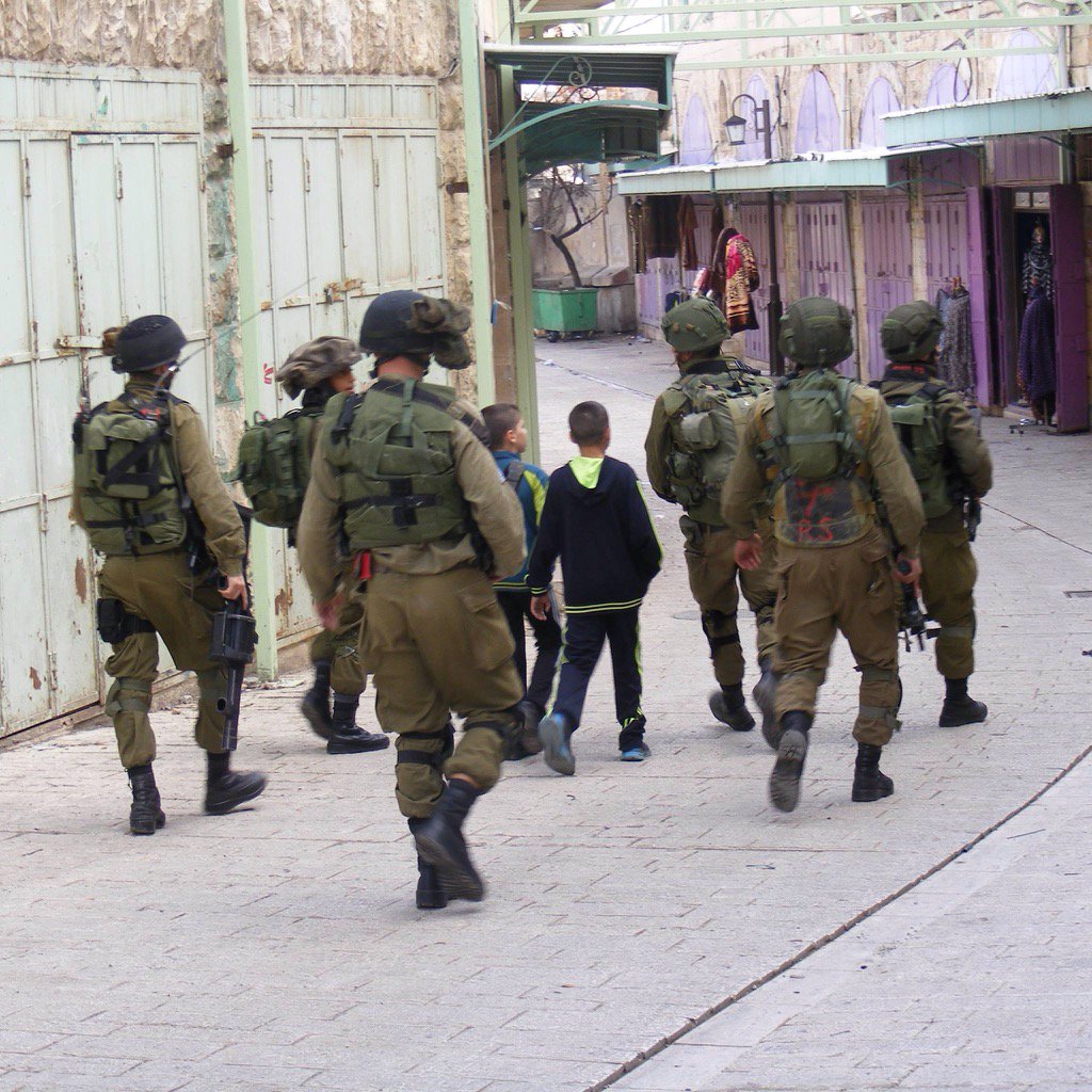 LanaBardawil's tweet photo. How many armed Israeli soldiers does it take to arrest two 10 yo Palestinian children? https://t.co/pUcrXstJHM https://t.co/w4yKghUHEa
