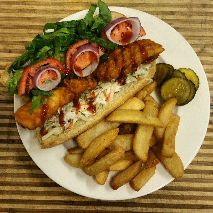 MyFathersStache's tweet photo. Sriracha-tossed cod po'boy w/ Sriracha glaze. Get some of that, lads https://t.co/o8BNBy5fZz