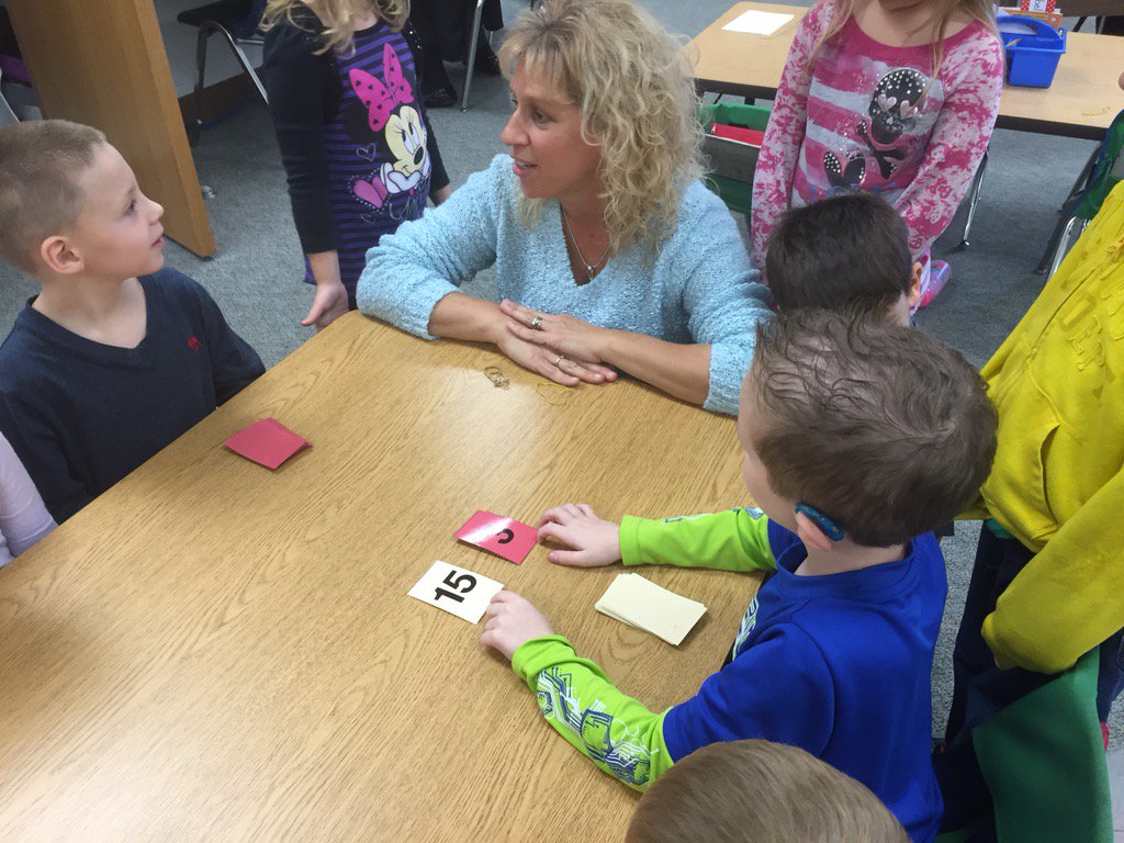 Learning how to play Top It with Mrs. C.