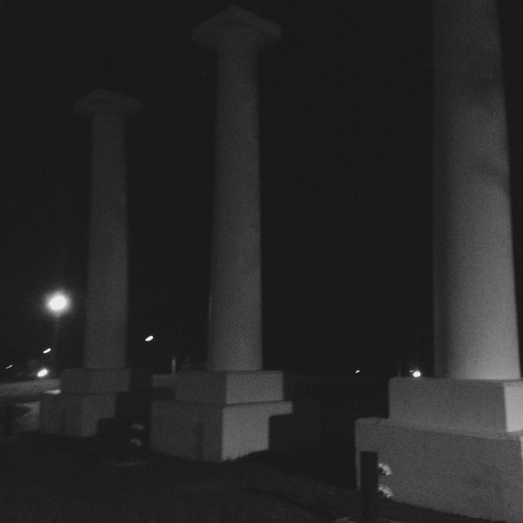 DemonClaw's tweet photo. The Three Columns are dark tonight, in memory of President Emeritus Randy Webb, 1943-2015. @nsula @DrJBHenderson https://t.co/aTrcd3Hb65