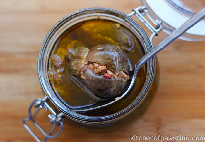kitchenofPal's tweet photo. Long awaited #Makdous is ready! Baby eggplants stuffed with goodness &amp; drenched with #oliveoil . #palestinianfood https://t.co/yPEoreB1jp