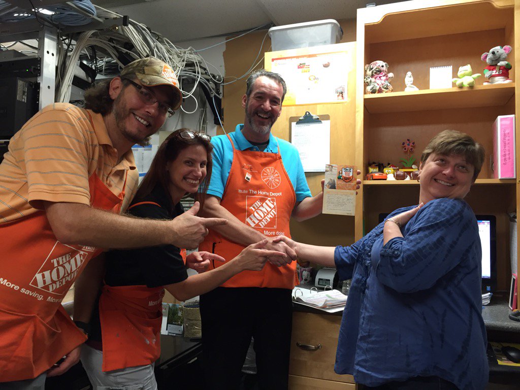 Cos Tonya and 245 PS Sheryl and DH Peter assisting in handing out a Homer Award for supporting HDI services.