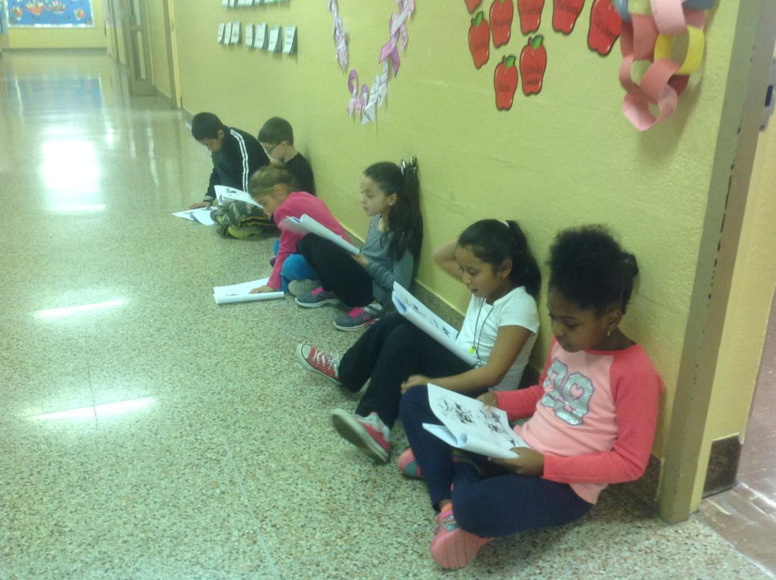 Buddy reading for fluency practice during reading centers in Mrs.Tyler andMrs. Green's collaboration class.