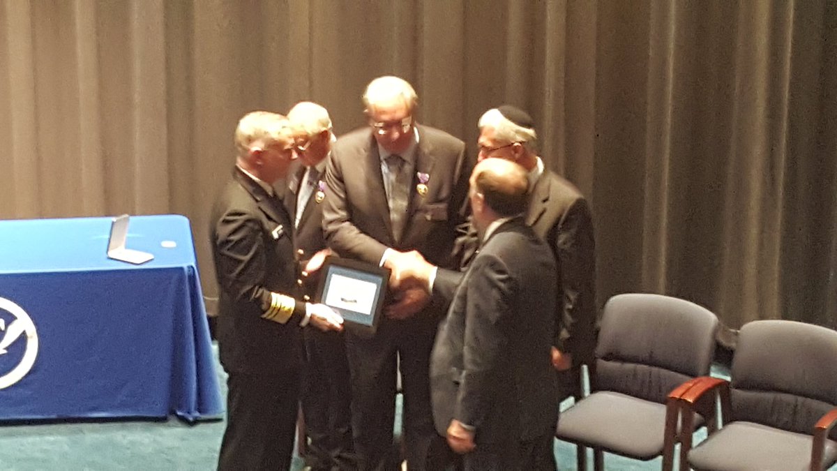 theWeatherboy's tweet photo. Dr. Louis Uccellini, Director of @NOAA'S @NWS, presents plaque to Purple Heart medal recipient families. #Muskeget https://t.co/FGgTy4QaHj