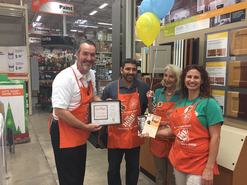 Celebrating two success at 245, top performing store in The TA market and a Homer with Mike, Electra and Sheryl.
