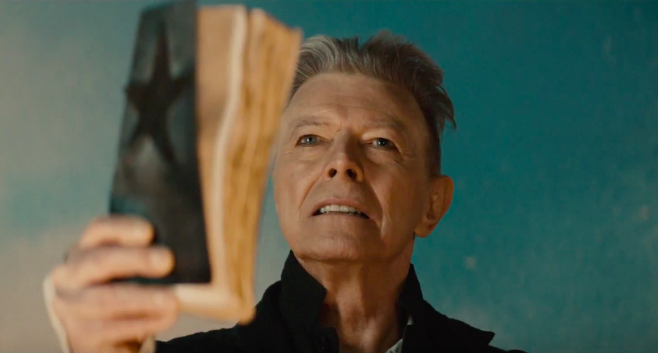 pitchfork's tweet photo. Watch @DavidBowieReal’s epic “Blackstar” video https://t.co/r0NXTiOjru https://t.co/yedzMLmVGw