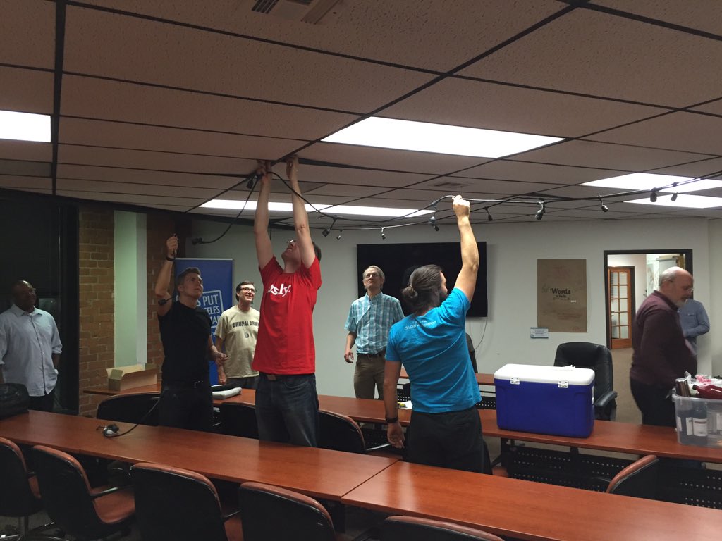 Doc from <a href="/fastly/">Fastly</a> helps <a href="/christefano/">christefano</a> set up lights for #Celebr8D8 in LA. Starts in 1 minute! meetup.com/greater-los-an…