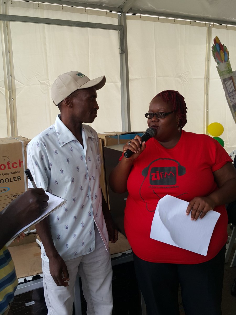 BonMarcheZim's tweet photo. The first Afdis wine cooler winners are I Shah and D Jonas speaking to @Sokostina  #LivItUpFiesta https://t.co/d5nHuxUThL