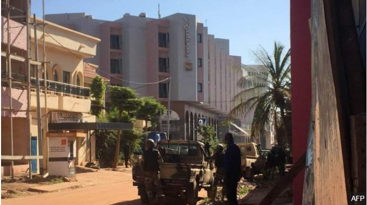 BBCAfrica's tweet photo. Photos from outside Radisson Blu hotel in #Bamako, Mali, where gunmen have taken hostages https://t.co/7BOh6yKeBe https://t.co/i6iaDdOq0C