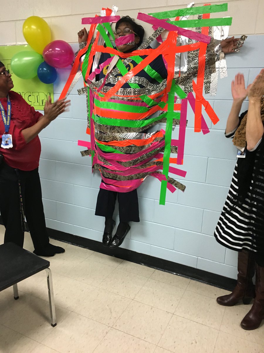 Our principals were "Stuck for a Buck" in the Tape the Principals to the Wall fundraiser! @MASALeads