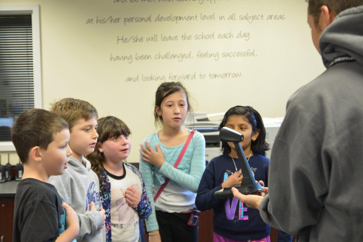 AptakisicTripp's tweet photo. @D102Tripp students proudly lead the school in the Pledge of Allegiance. #EverydayEverystudent #d102learn https://t.co/rUW901Zsh0