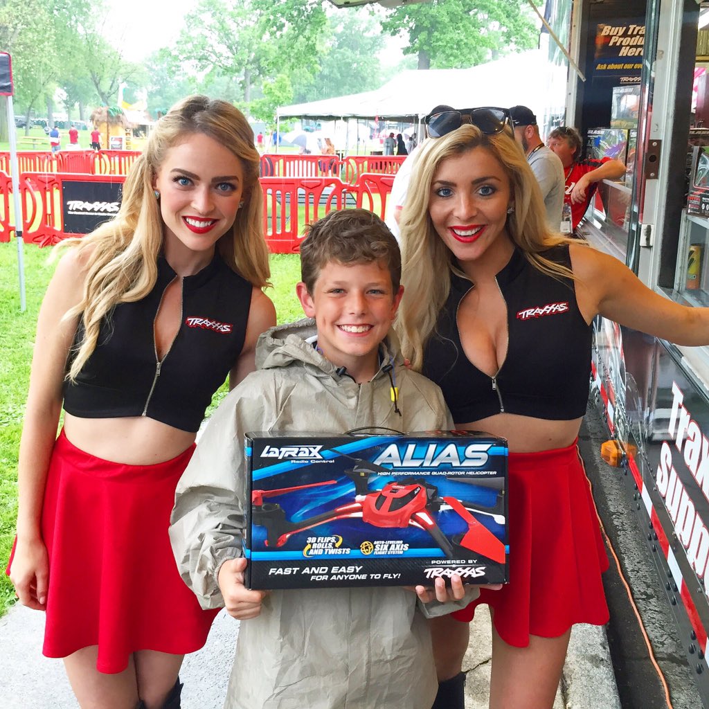TraxxasGirls's tweet photo. We can't tell if this guy is more excited about a picture with the #Traxxas Girls or his new @latraxrc #Alias... 😜💋 https://t.co/SX4rRDWfvp