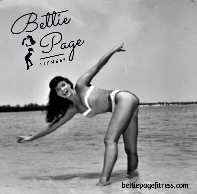 Here's a fun shot of Bettie looking like she's getting into Revolved Triangle Pose (Parivrtta Trikonasana). #getfit