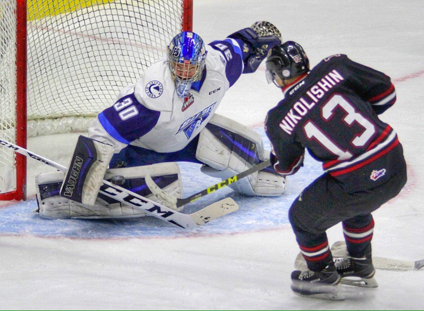 JeffStokoe's tweet photo. @Rebelshockey @NikoVanya11 Ivan Nikolishin pots his first of the night against Saskatoon blade goaltender BrockHamm https://t.co/FXOpBSeX0A