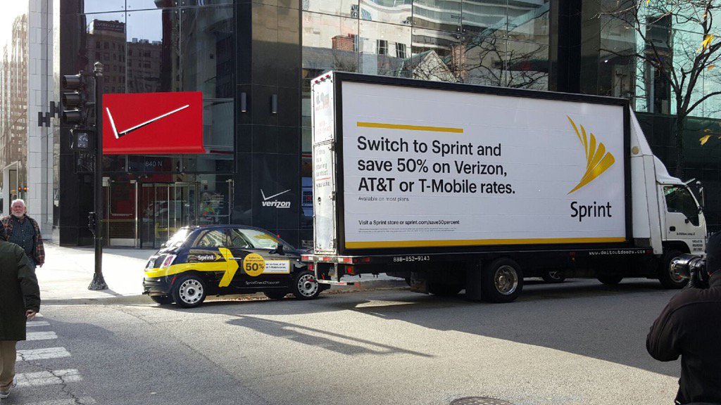 marceloclaure's tweet photo. My @sprint team in Chicago doing some local marketing in front of the @verizon store. https://t.co/vPEbJUnkxF
