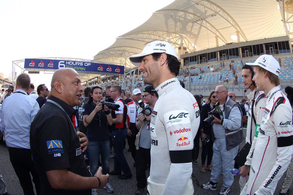 BAH_Int_Circuit's tweet photo. Pole-sitter @AussieGrit and team just a few minutes before it all kicks off #FIAWEC #6HBahrain https://t.co/PO5l1CWS9r