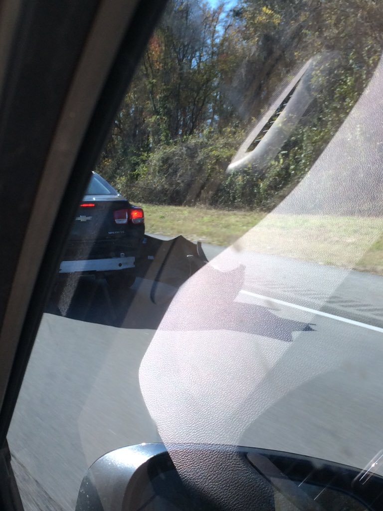 jhramer's tweet photo. We have been behind this guy for like 15 miles. The car in front of us finally got his attention. #bumperproblems https://t.co/hRbtuVhjbW