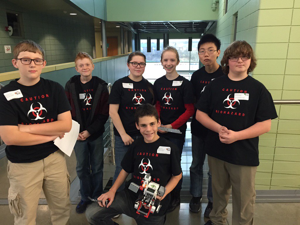 Team "Biohazards"- ready to be judged on their robot programming skills. Time for Q&amp;A on the spot with judges!