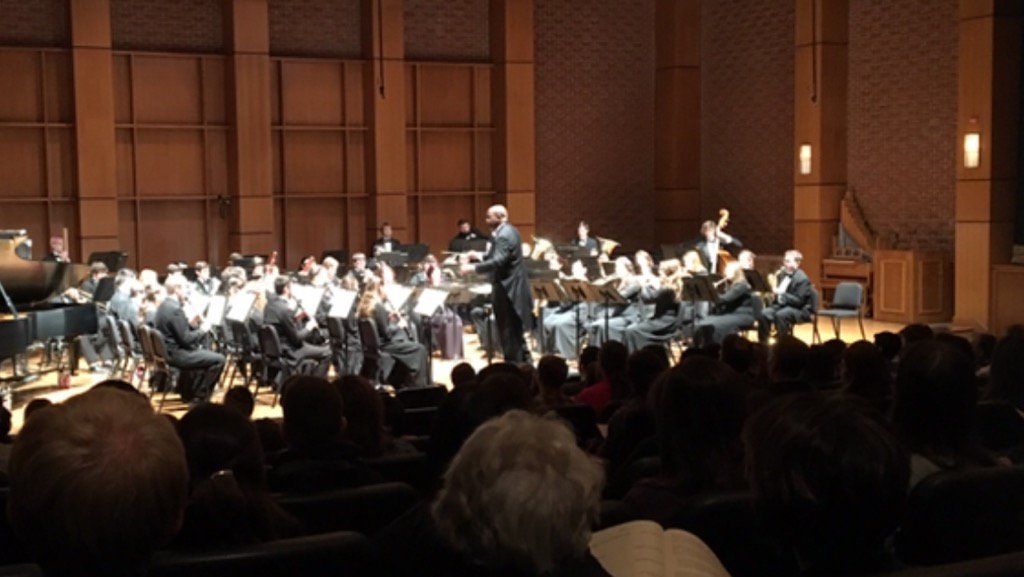 SU Symphonic Band concert begins Symphony #1, The Lord of the Rings. Spectacular sounds led by Professor Eric Hinton
