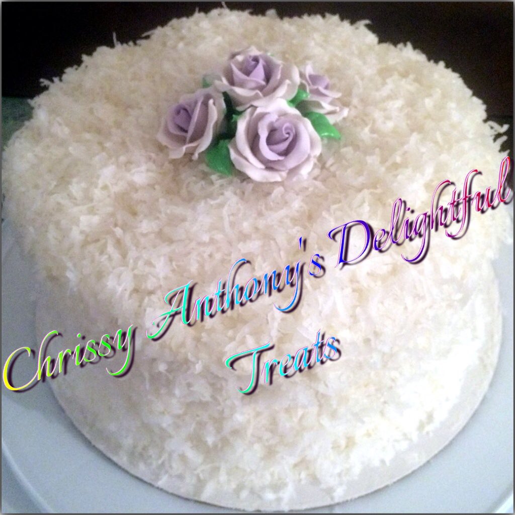 Vanilla Cake w/ pineapple filling, buttercream icing &amp; shredded coconut