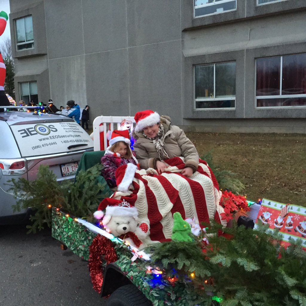 EEOSolutions's tweet image. Diana and Addison sat on our float.#Fredericton #SantaClausParade