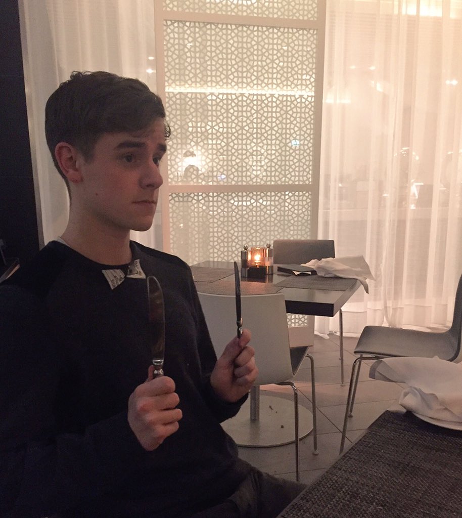 connorfranta's tweet image. underdressed at a fancy restaurant so i made a bow tie out of a sticker i found in my pocket