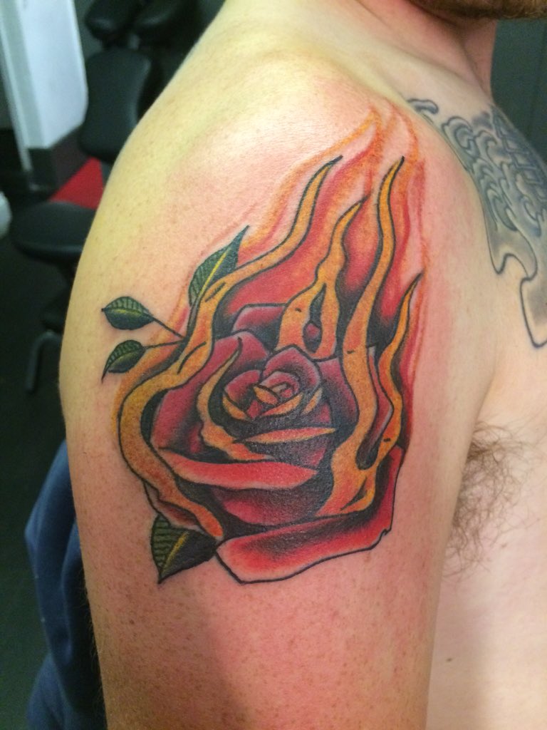 Tattoo uploaded by Levgen  Flaming Rose  Tattoodo